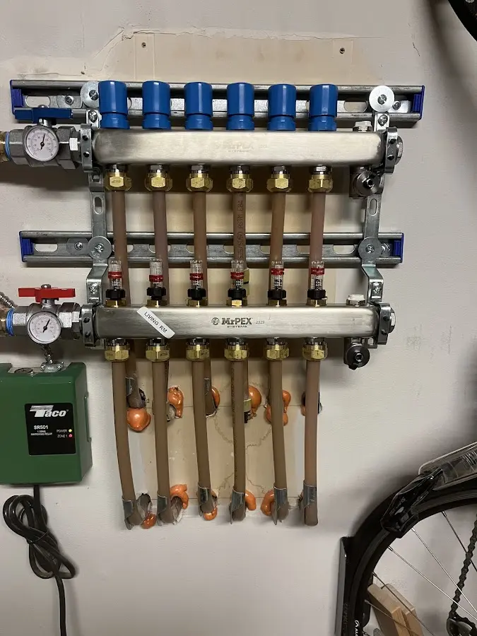 Plumber performing Gas Line Installation at a residential property in Cloverly